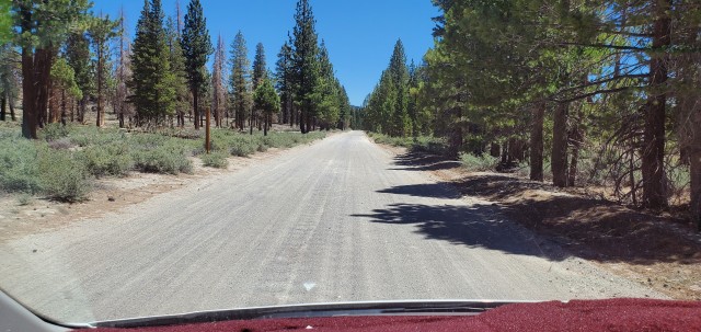 photo showing a wide dirt road